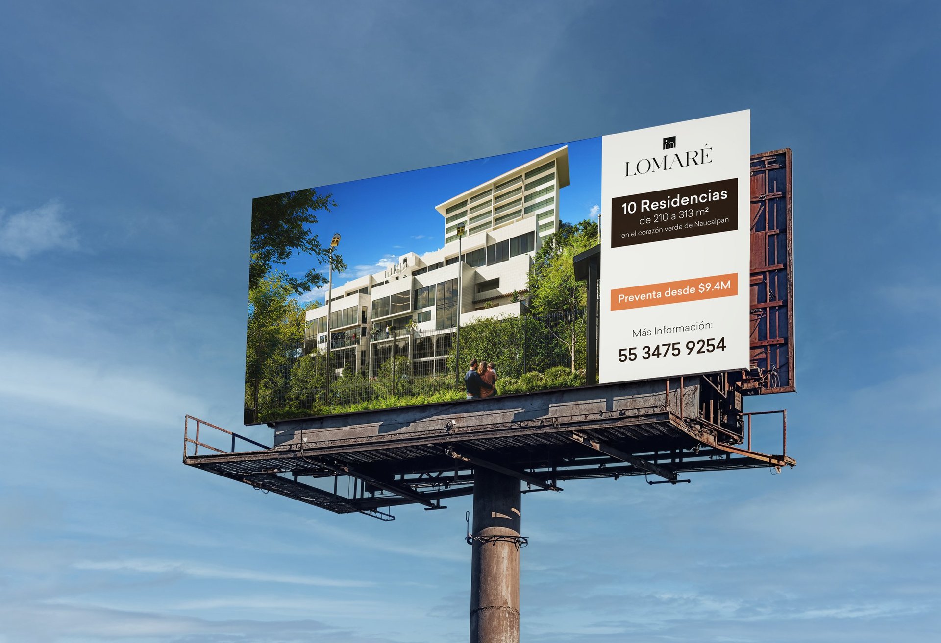 Outdoor billboard advertising Loniski residences with building image and contact information against blue sky