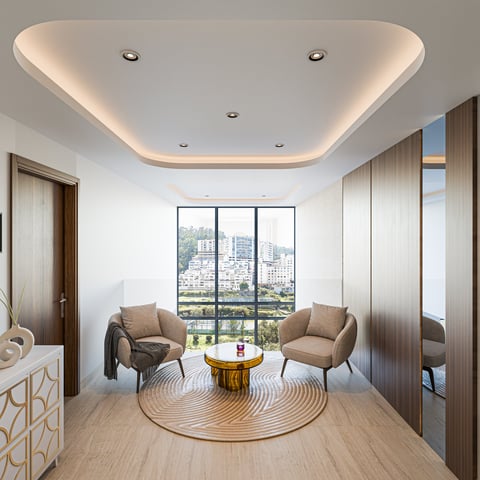 Modern living room with two beige armchairs, round wooden table, city view windows, tray ceiling with recessed lighting, and light wood flooring