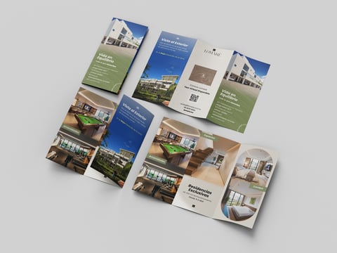 Folletos y flyers con imágenes arquitectónicas en azul y verde sobre fondo blanco
