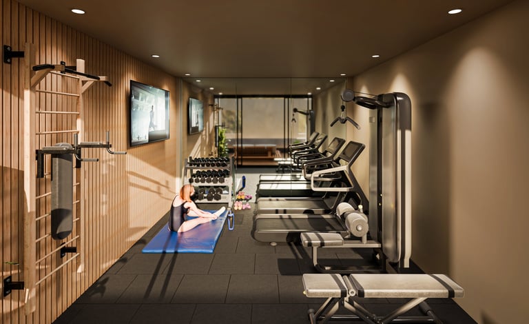 Modern home gym with exercise equipment, treadmills, and a woman doing yoga on a mat