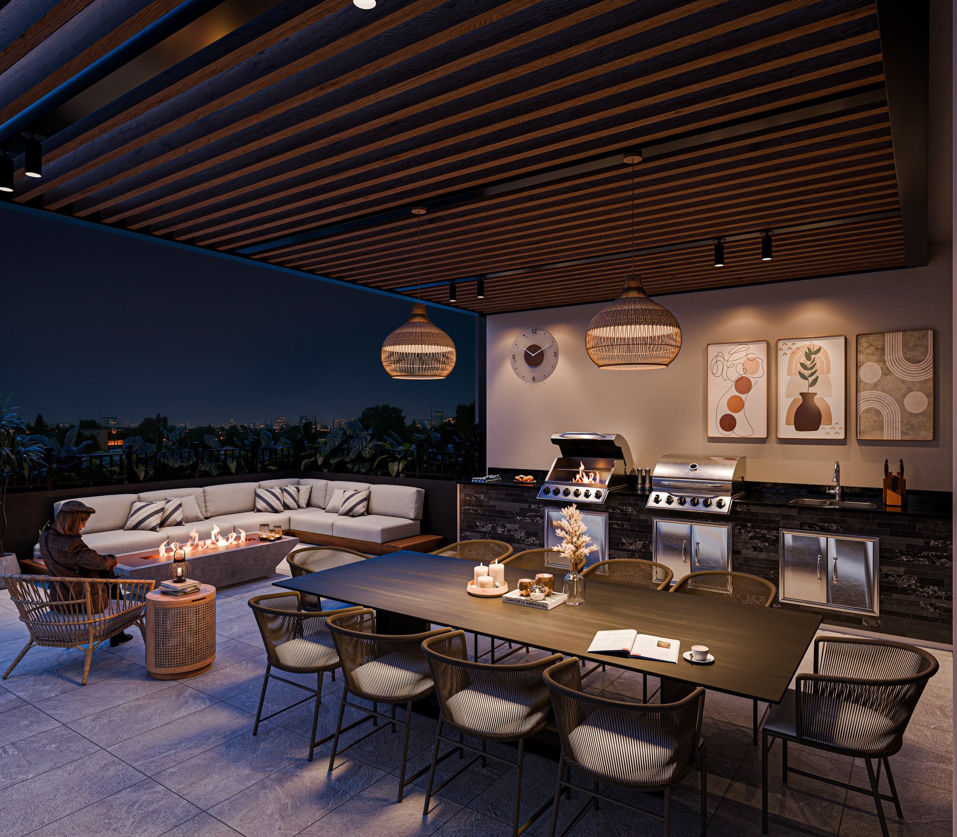 Modern rooftop terrace with dining table, lounge seating, kitchen area, and illuminated pendant lights at dusk